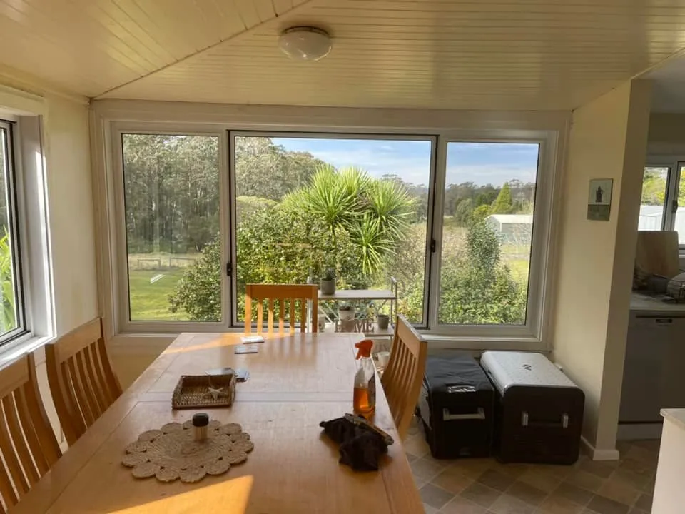 Dining room with new windows fitted, looking out to the garden