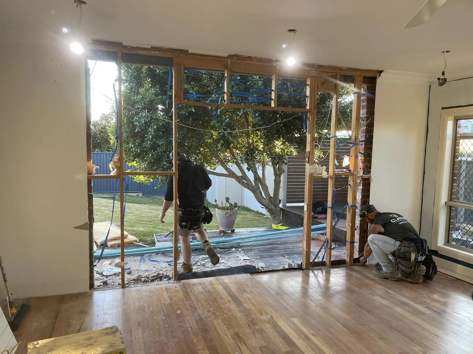 Room with a new doorway opening being framed in timber
